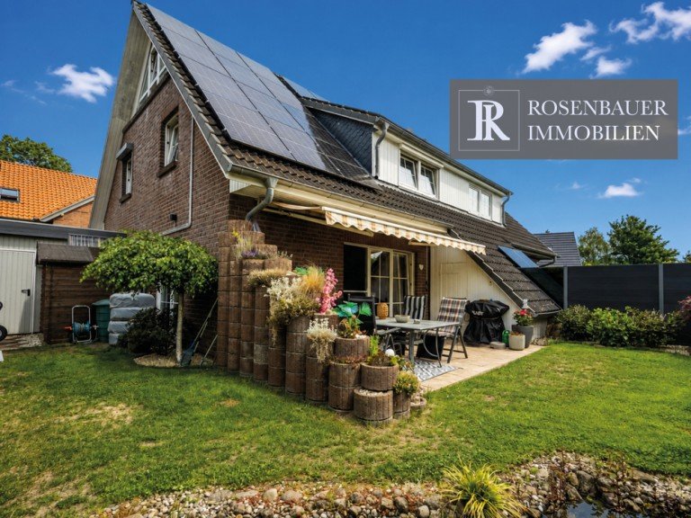 Haus Gartenseite KI Bargfeld-Stegen Doppelhaush�lfte FAMILIENGL�CK IN BARGFELD-STEGEN! MODERNISIERTE DOPPELHAUSH�LFTE MIT PV-ANLAGE & S�DWEST-GARTEN