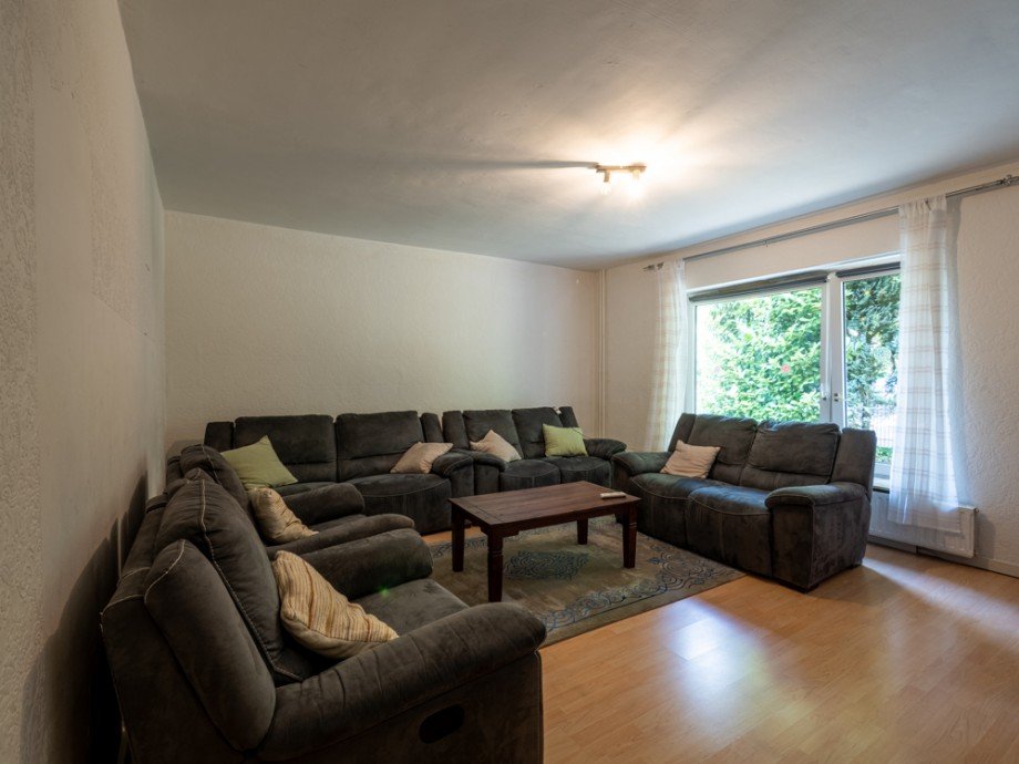 Wohnzimmer Wohnung EG Mehrfamilienhaus Ahrensburg